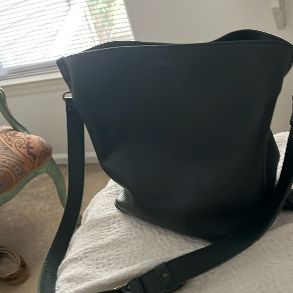 Gorgeous green pebble leather shoulder bag.  Barely used. 12x12.